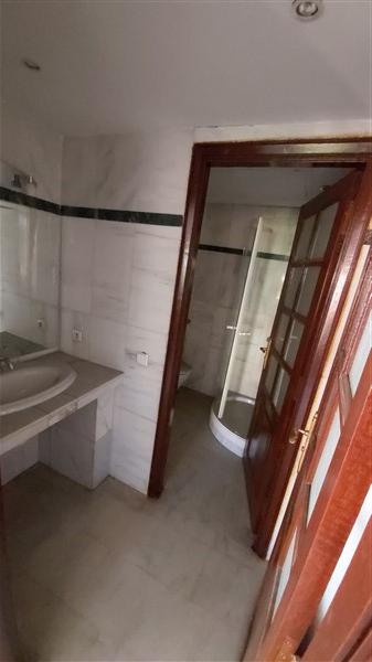 Immobilier Hivernage Marrakech : façade d'une résidence sécurisée